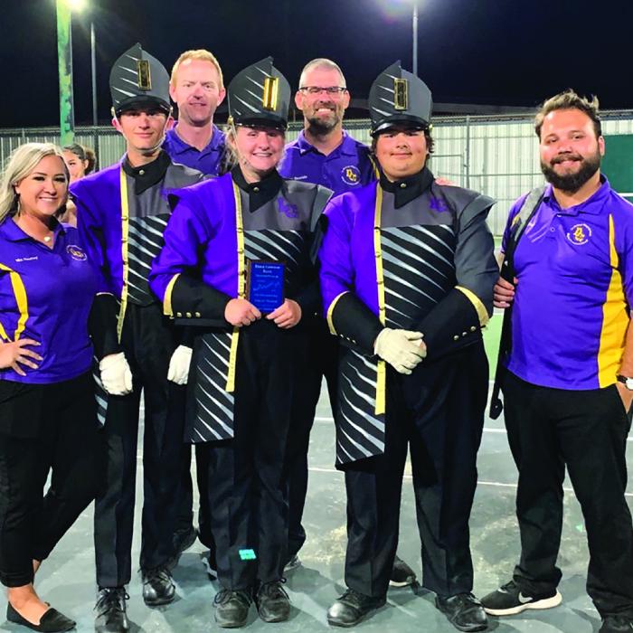 La Grange band staff and student drum majors, left to right: Sarah Fourmy, Layne Huenefeld, Chris Cooper, Jill Newton, Eric Daniels, Jonathan Delgadillo and Christian Pitre.