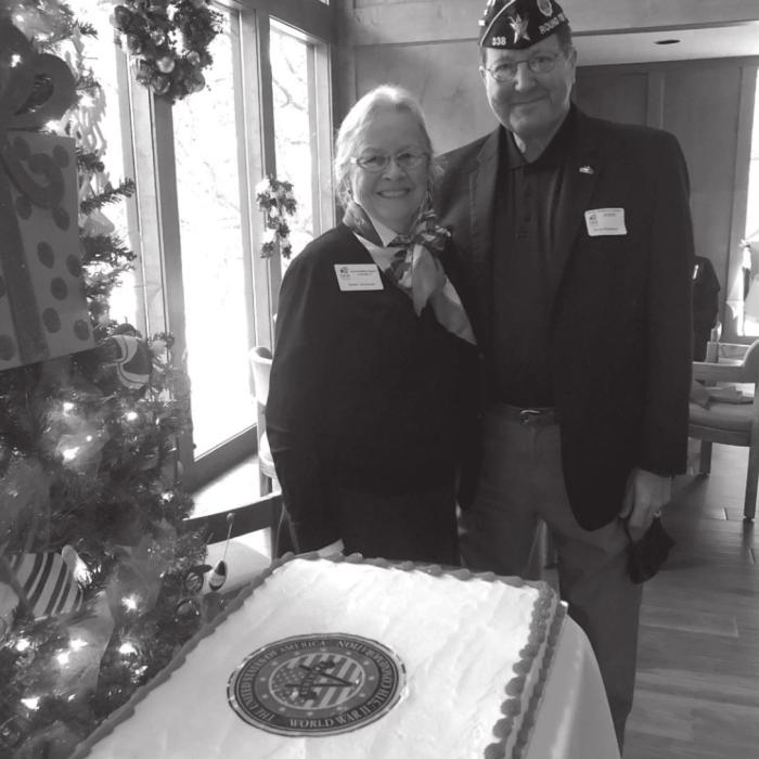 Smith McMillan Chapter member Sally Reynolds, daughter of the late WWlII co-pilot, Lt. George Cooksey, is pictured with Bruce