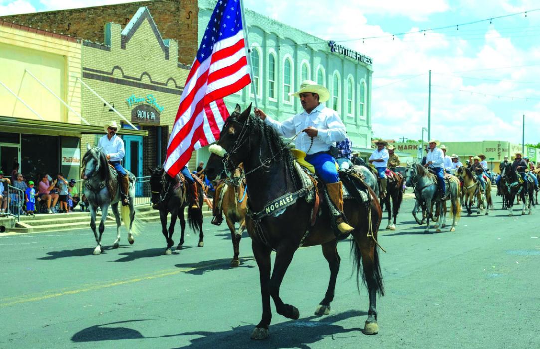 An equestrian group led by Orlando Adame brought up the rear of the Schulenburg Festival Parade.