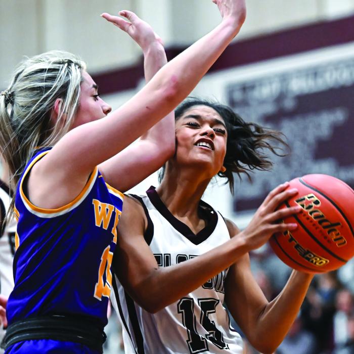 Flatonia’s Kalen Scott takes an elbow to the cheek sending her to the free throw line in Tuesday nights 47-40 win over Weimar. Photo by Stephanie Steinhauser