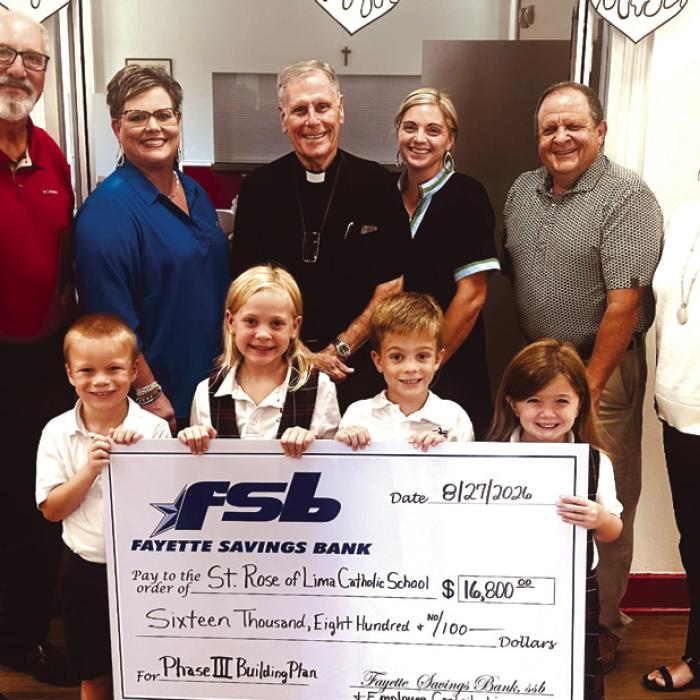 Pictured front row, from left: St. Rose students Waylon Neskora, Paisley Guentert, Henry Neskora, Drew Schneider; back row: Mike Olle and Cheryl Brossman, representing FSB and personal donors; Father Jasper Liggio, Taylor Jensen, St. Rose School Principal; Rodney Kalich and Darlene Brothers, representing FSB and personal donors.