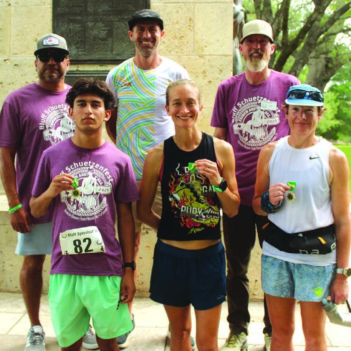 Shown here are the winners of the Spasslauf 5K (the fun run from downtown La Grange to Monument Hill that kicked off Saturday’s Schuetzenfest). Front row, left to right – Abbot Acosta (Overall winner and Men’s champ), Brooke Nelson (Women’s Champ), Nikole Tan (Women’s Masters champ); Back row - Race organizers Aaron Muniz and Cal Neff, and Dan George (Men’s Masters champ). Photo by Jeff Wick