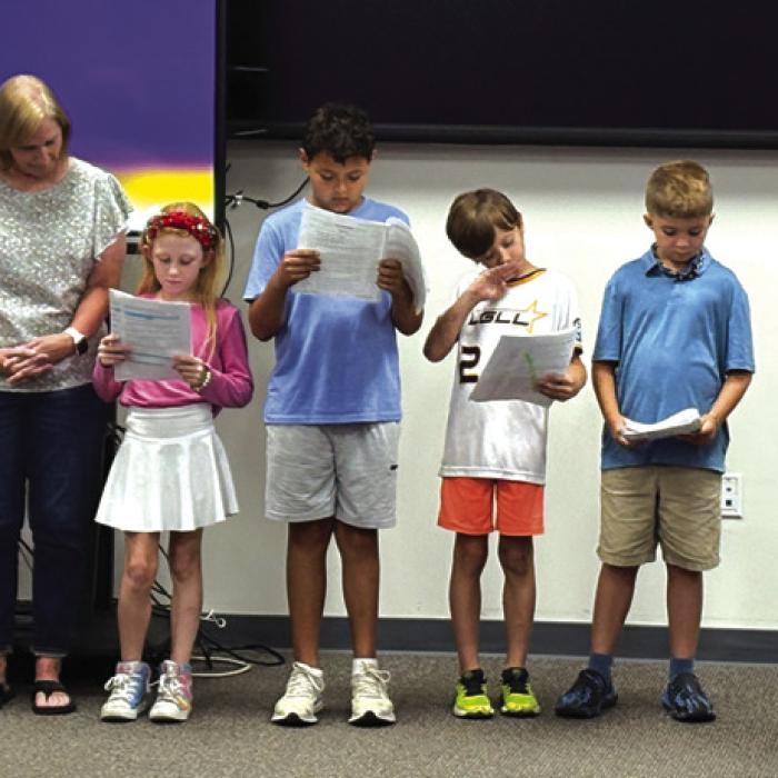 Some of the students who participated in Camp Summit this summer performed a readers’ theatre of the familiar story “The Three Little Pigs.” Shown here are staff members, Tracy Head-Director of Curriculum, Tammy Naumann-educational aide, and Sharon Novak-teacher, along with five of the students who participated in the camp.