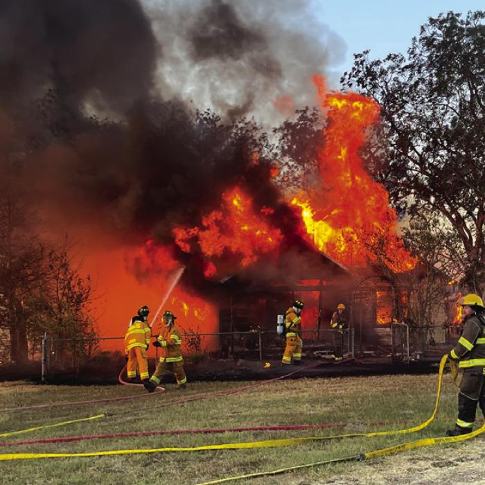 Firefighters at the scene of Monday’s fire.