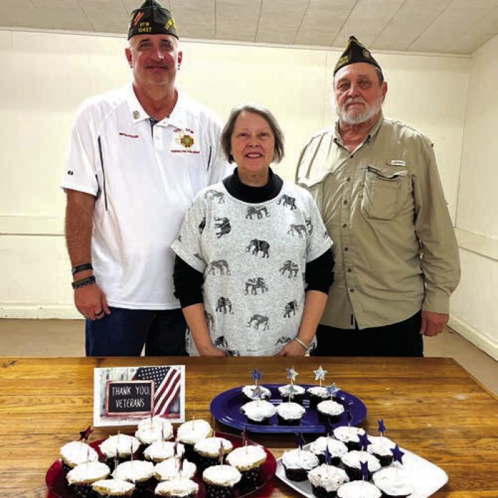 Veterans were especially remembered at the Nov. 15 joint social of the Fayette Memorial Post 5254 Veterans of Foreign Wars and Auxiliary of La Grange. The Veterans were thanked for their service and treated to cupcakes by the Auxiliary members. Pictured from left are Mitch Fuller, Senior Vice Commander of District 28; Marilyn Kothmann, President of VFW Auxiliary 5254; and Andy Kruppa, Commander of VFW Post 5254.