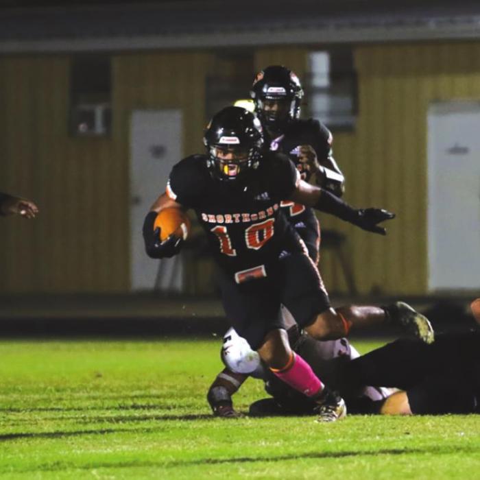 Schulenburg’s Desmond Lewis finds some open space as he runs the football Friday. Photo by Audrey Kristynik
