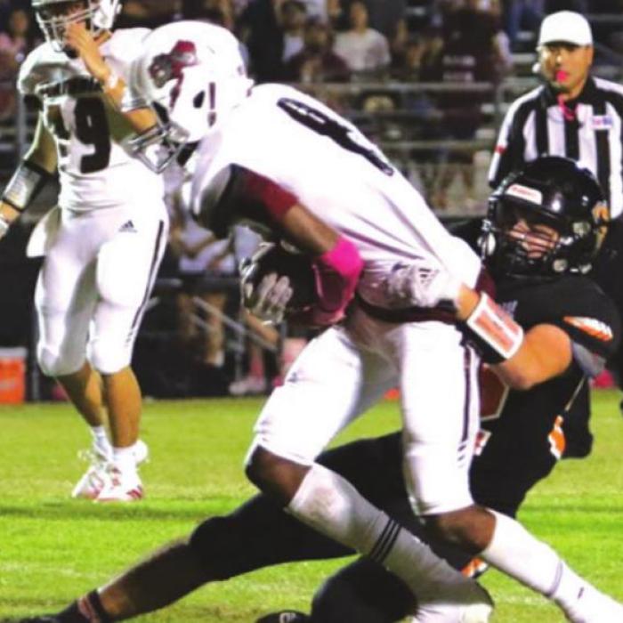 Flatonia’s Jaidyn Guyton proves tough to bring down Friday. Photo by Audrey Kristynik