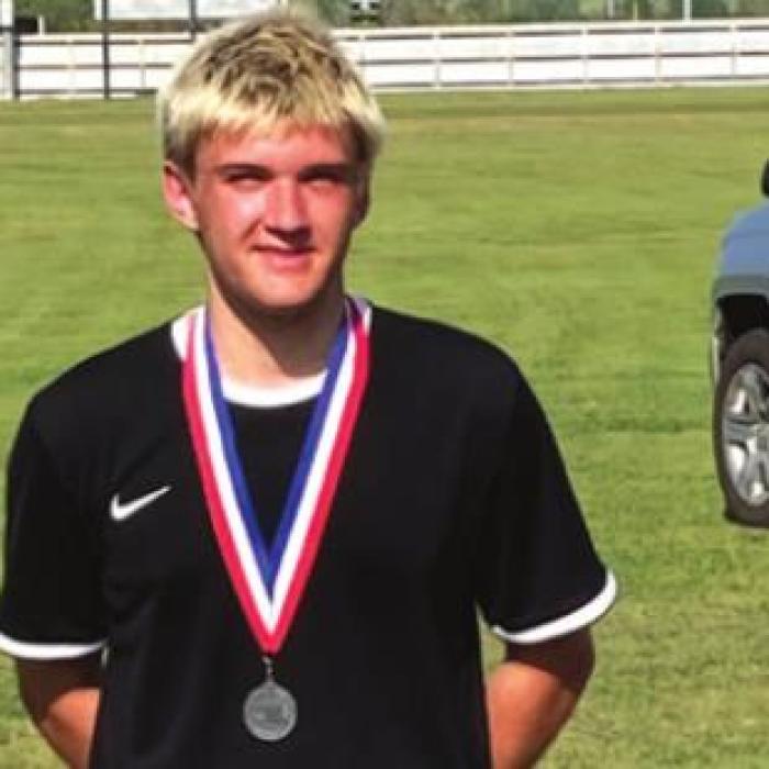 Oz Oldham was second in boys varsity singles.