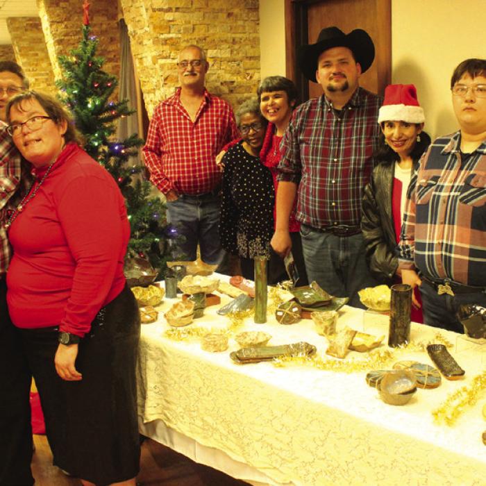 At the Gray Legacy Services Christmas Party earlier this month, the above residents had an entire table of the pottery they have made and are selling. Photo by Jeff Wick