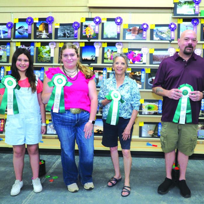 Photography: Child Division (8-12)-Elyse McBroom-Water Drops on Flowers; Teen Division (13-17)-Rheagan Karisch-Ice Ice Baby; Golden Age Division-Denise Winter-Roxy; Semi-professional Division-Tim Turnbull-Autumn Reflections; not pictured-Adult Division (19 and up) Nisha Coker-Up in the Cloud.