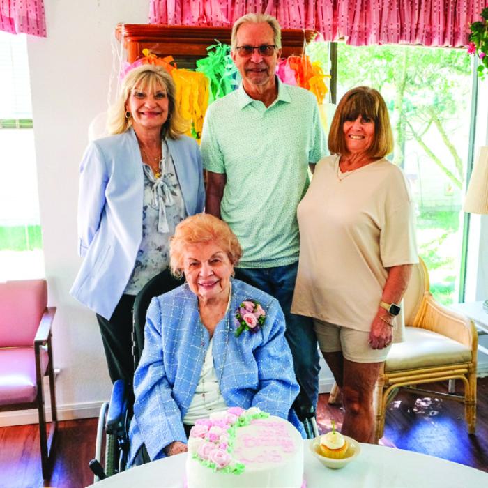 Lois Demel of Schulenburg (seated) celebrated her 100th birthday on April 7. She is pictured here with (standing, from left) her daughter Gayle Spence, son Dennis Demel and daughter-in-law Kim Demel. Photo by Andy Behlen