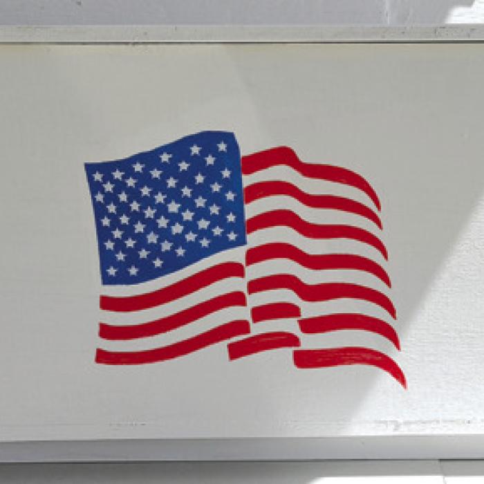 If you go by the patio at Zilss Hall in Winchester you will find a drop box that has been built for and designated as a drop point for damaged flags, Flags may be deposited in the box and then they will be taken by a member of the Winchester Area Civic Association to the old jail in La Grange for disposal.