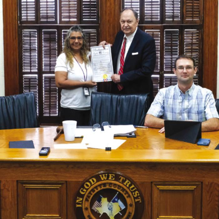 Fayette County Commissioners Court signed a proclamation last Thursday designating April as Child Abuse Prevention Month in Fayette County. On hand for the signing was Cindy Chester of Youth and Family Services. Pictured are (from left) Pct. 4 Commissioner Drew Brossmann, Cindy Chester, County Judge Dan Mueller, Pct. 2 Commissioner Clint Sternadel and Pct. 1 Commissioner Jason McBroom. Photo by Andy Behlen