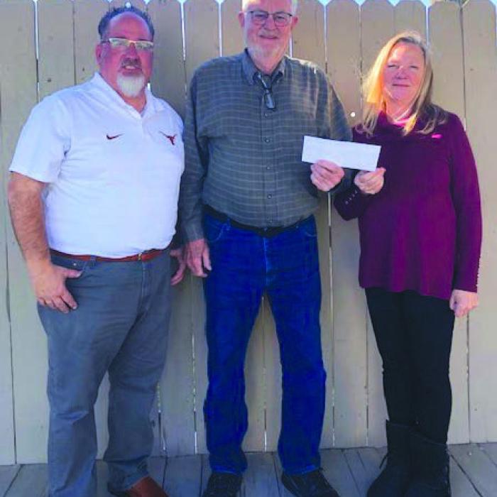 The Holy Smokers of St. James Episcopal Church made a $1,000 special year end donation to Tejas Healthcare. Pictured from left are Gene Carson, Tejas CFO, Holy Smoker Joe Bailey, and Tejas Healthcare CEO Sheri Kehler.