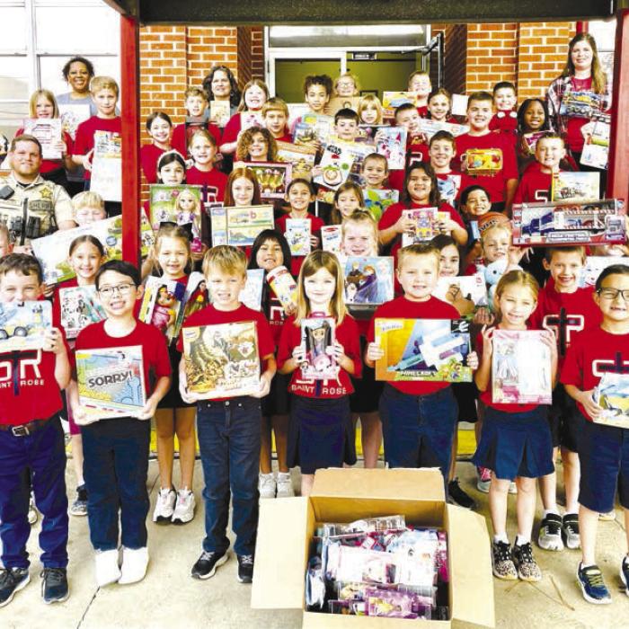 The students of St. Rose of Lima Catholic School in Schulenburg held their annual Christmas Service Project donation collections up until the Christmas holidays. Grades 1-4 donated new toys to the Fayette County Sheriff’s Department Deputy Santa Program to help less fortunate children in the area.
