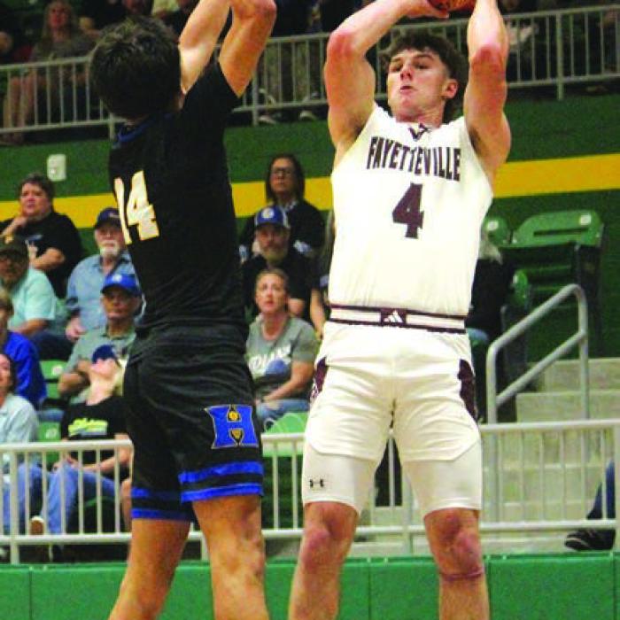 Fayetteville’s Jack Schley takes a shot in the first half Monday. Photo by Jeff Wick