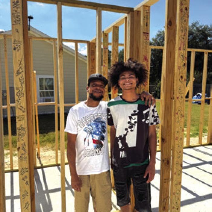 Johnny Wright and his eldest son, Demarion, have been hands-on throughout the process, working alongside Habitat volunteers on Thursdays.