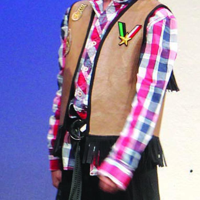Bailey Tousek as the Dwarf.