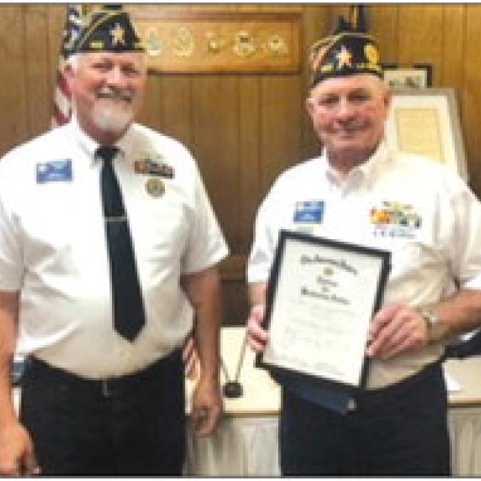 Pictured from left is Commander Richard Gray and James Bramblett.