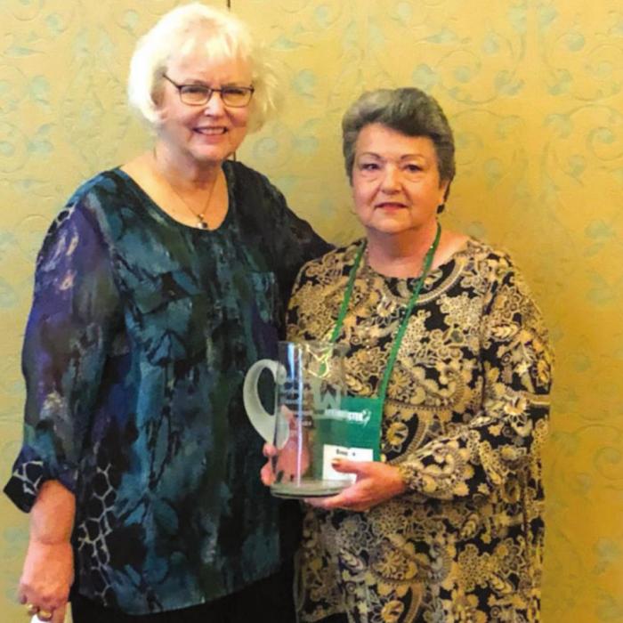 Brenda Woelfel was awarded Beefmaster Cattle Woman of the year at the National Cowgirl Museum and Hall of Fame. She is pictured here with cattlewoman president Kathy Skinner.