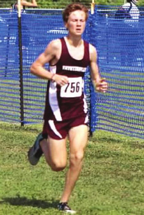 Fayetteville’s Cole Fenhaus was the top local at the state cross country meet, finishing 11th in 1A. He is shown here at regionals. Photo by Amy Fritsch