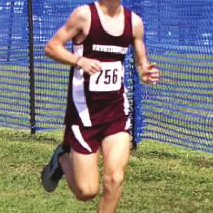 Fayetteville’s Cole Fenhaus was the top local at the state cross country meet, finishing 11th in 1A. He is shown here at regionals. Photo by Amy Fritsch