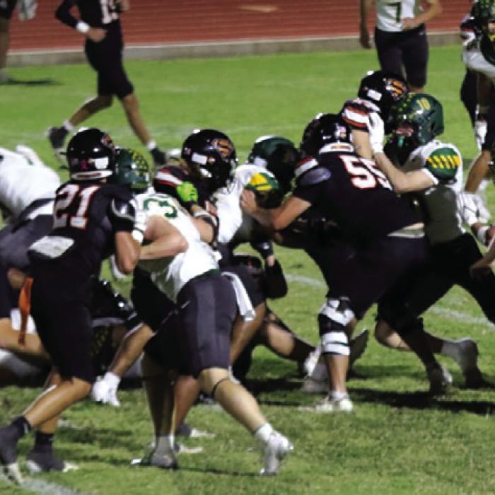 A mass of bodies battle one another in Friday’s football game between Schulenburg and Lexington. Photo by Audrey Kristynik