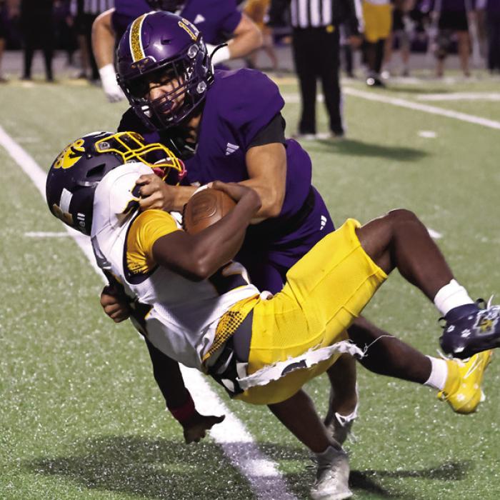 La Grange’s Van Hill makes a tackle of a La Marque ballcarrier in last Friday’s game. Photo by Darrell D. Gest
