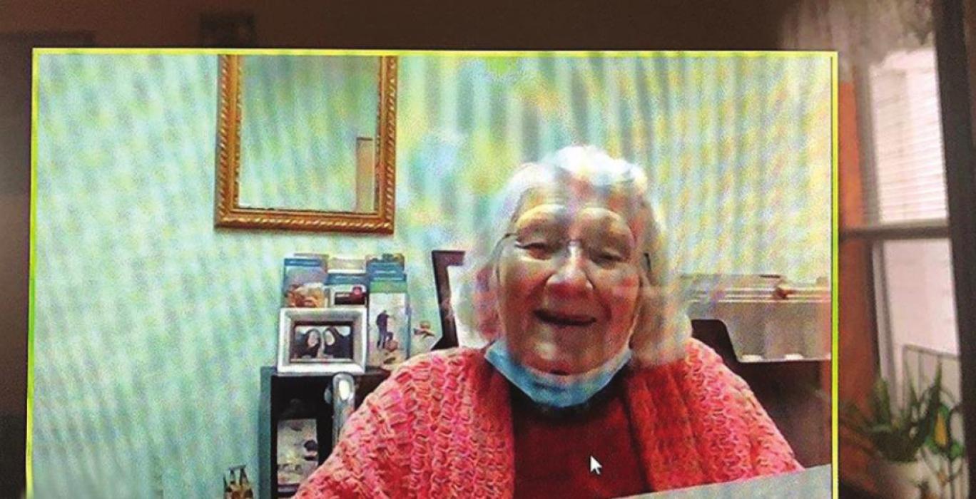 Longtime Flatonia resident Martha Tauch, who turned 104 on Dec. 30, grins at the computer screen during the first Zoom call of her long life.
