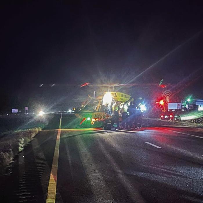 First responders load an injured patient into a medical helicopter from PHI following a major crash on Interstate 10 Sunday evening, July 13. Photo courtesy of Schulenburg VFD