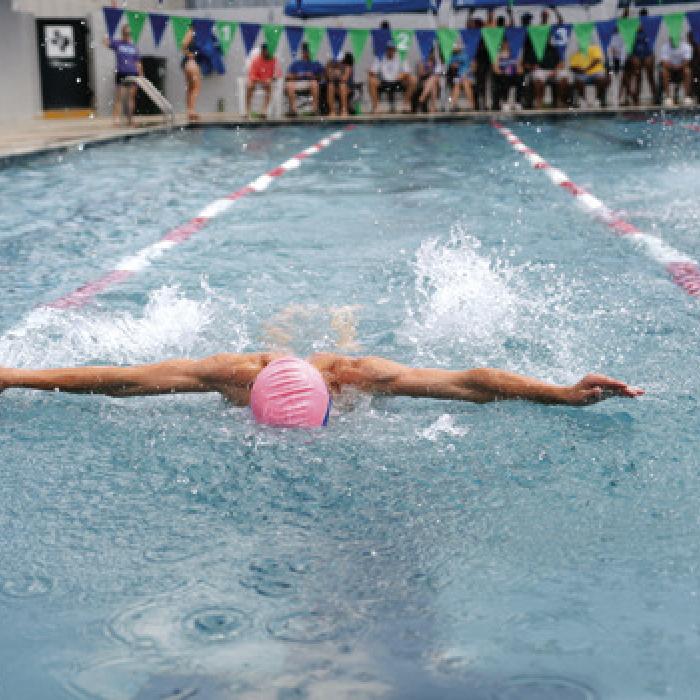 Oliver Schmidt swimming the Individual Medley. Photo by Brittany Dawson