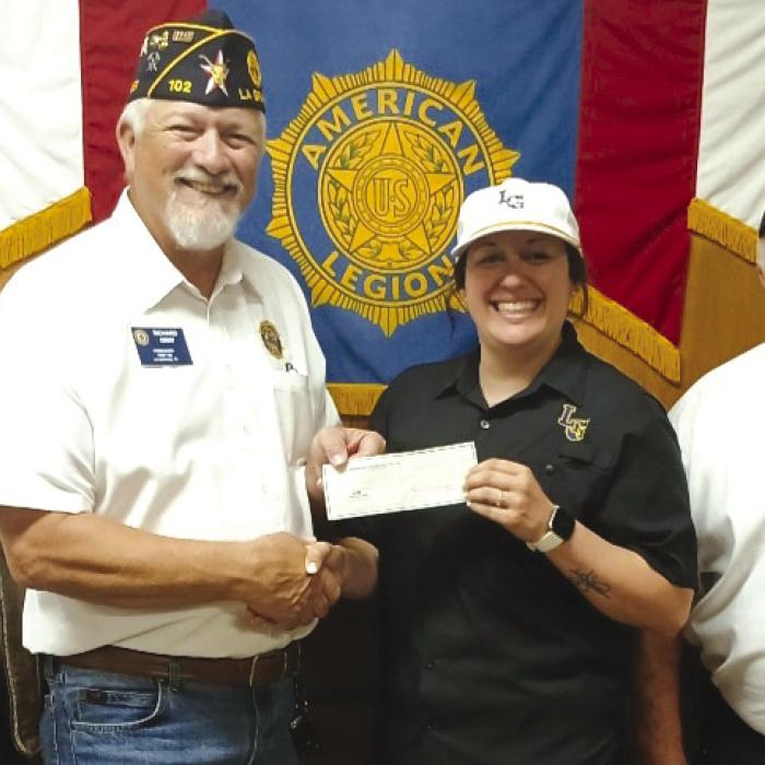The American Legion, H J Ehlers Post 102 of La Grange voted to assist area Little League teams with Sponsorship of 4 teams in the playoffs. Pictured (left to right) are John Marburger (Judge Advocate), Richard Gray (Commander), Samantha Zoch (La Grange Little League Board Member), and Ray Thurman (Hubmaster and Surgeon General).
