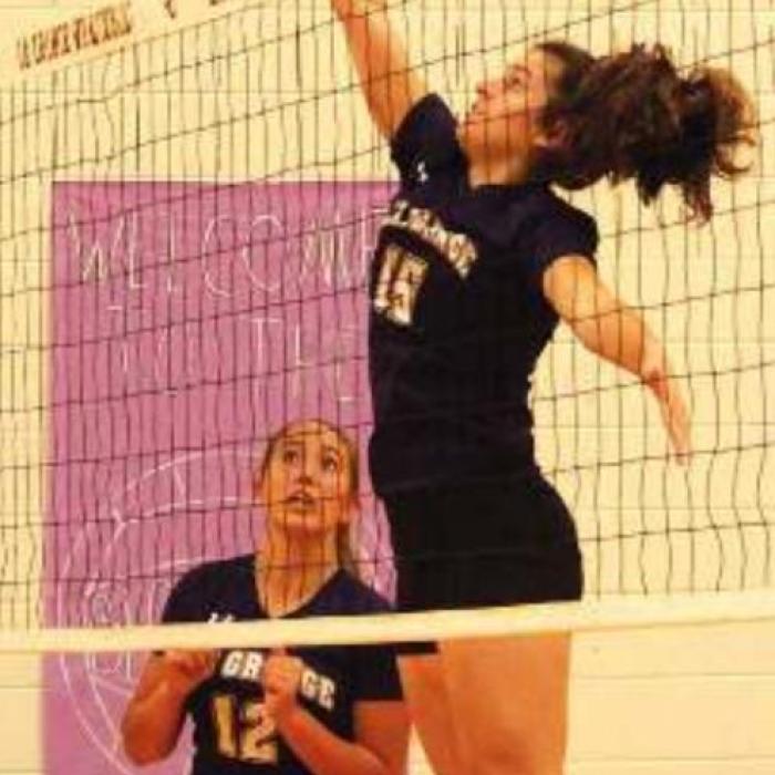 Ryann Marshall spikes a ball in Saturday’s match.
