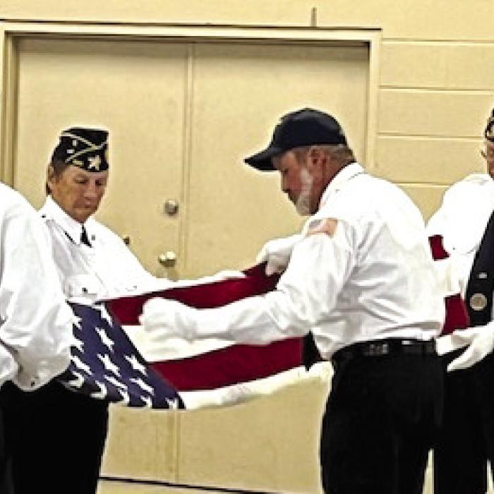 Folding the U.S. Flag at the Memorial Day Celebration.
