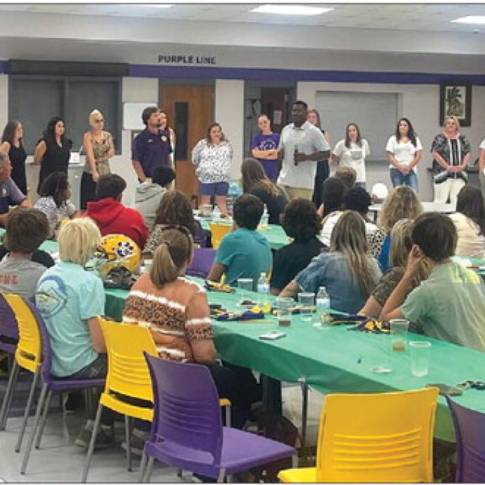 The La Grange football program participated in a “Helmets and Heels” Italian Potluck dinner Tuesday night at the La Grange High School cafeteria to honor football, dance and cheer participants and their mothers and mother figures.