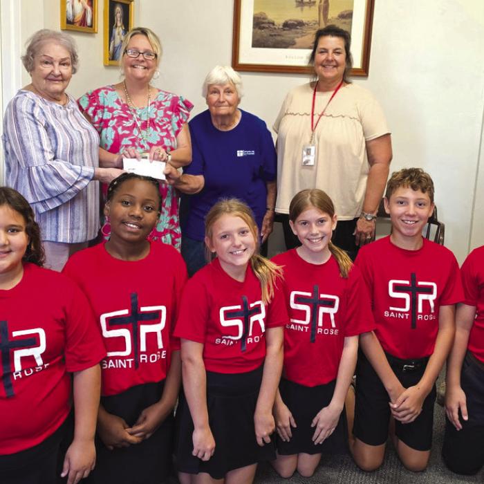 KJZT Ellinger Donates to Catholic Schools