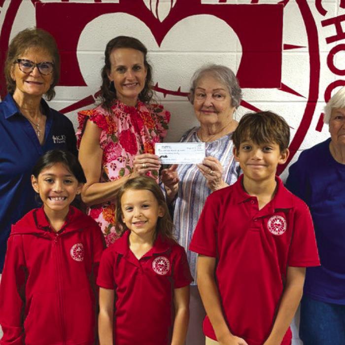 KJZT Ellinger Donates to Catholic Schools