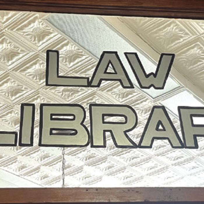The historic sign over the door to the Law Library at the courthouse.