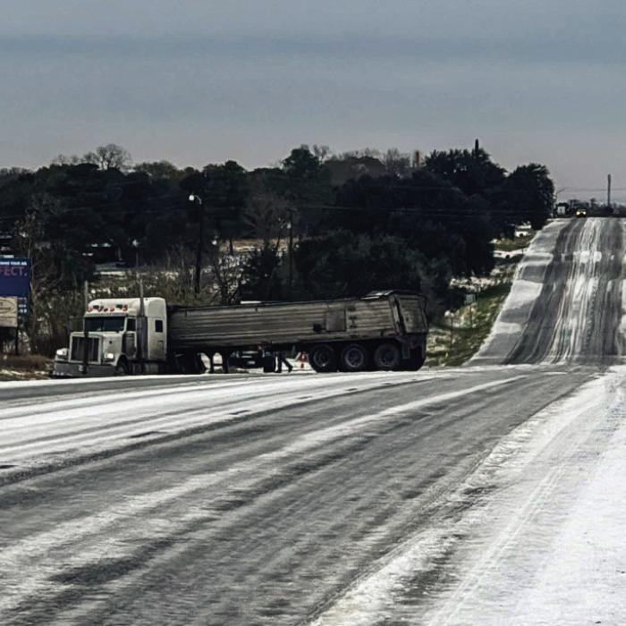 An 18-wheeler jackknifed on US 77 near Holub Rd. just north of Schulenburg Tuesday morning. Photo courtsey of the Schulenburg Police Department