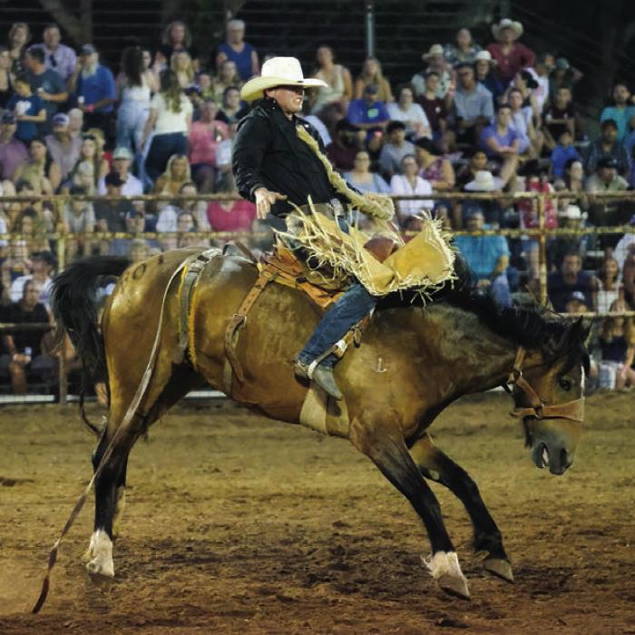 Cooper Bradberry of Brookesmith completed an eight second ride in the saddle bronc event during the Schulenburg Festival Rodeo Friday night.
