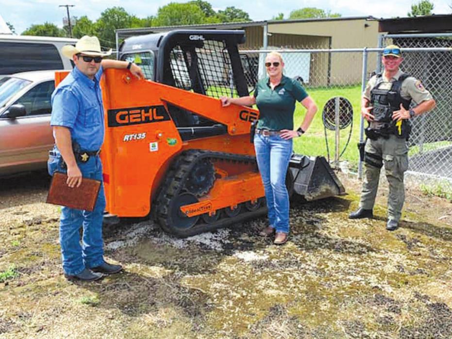 On Tuesday, the Fayette County Sheriff’s Office recovered a skid steer that was stolen from a Home Depot store in Austin. Pictured are (from left) Detective Garrett Durrenberger, Sgt. Angela Lala and Interdiction Investigator David Smith. Lala was the lead investigator on the case.