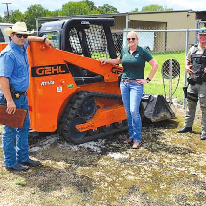 On Tuesday, the Fayette County Sheriff’s Office recovered a skid steer that was stolen from a Home Depot store in Austin. Pictured are (from left) Detective Garrett Durrenberger, Sgt. Angela Lala and Interdiction Investigator David Smith. Lala was the lead investigator on the case.
