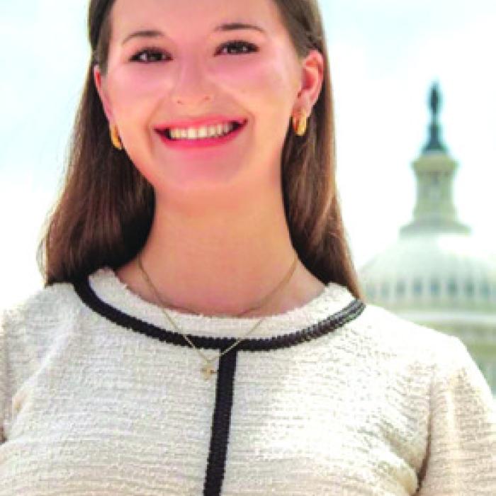 Amalia Rorschach with Capitol Hill in the background.