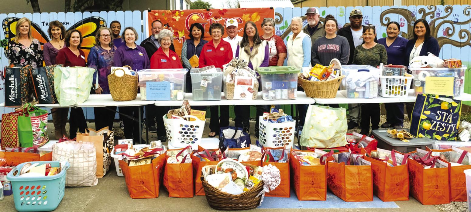 Local volunteers collected 81 Thanksgiving baskets for families in need. Shown here are many of those volunteers at the collection point last Thursday at Tejas Health Care’s Administration Building in La Grange. Photo by Andy Behlen