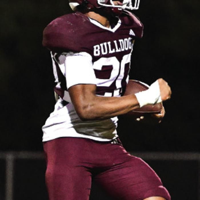Adrian Anderson scores for the Bulldogs in the second half of Friday night’s district game with Bloomington. Photo by Stephanie Steinhauser
