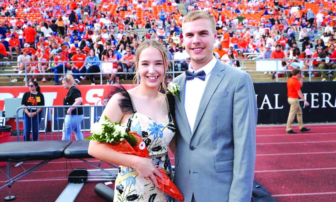 Dustin Canik (right) of Fayetteville and his campaign partner Megan Herzog (left) of Spring were both named Sam Houston State University Homecoming First Runners-up for Homecoming King and Queen. SHSU Homecoming candidates are voted on by all students of the University.