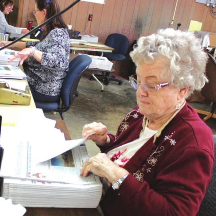 Jo Ann Mueller will slap a thousand or so address labels on newspapers every Monday and Thursday, and has been doing so for 21 years.