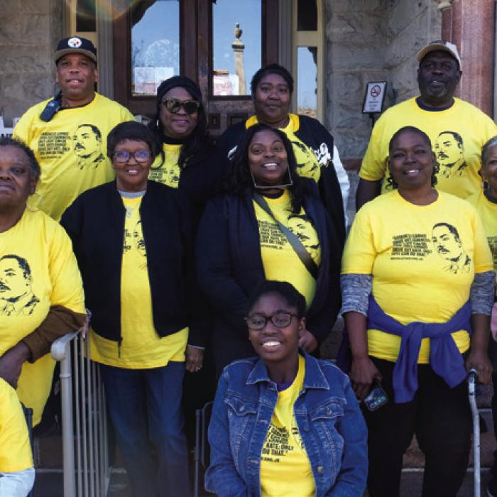 La Grange Juneteenth Committee organizers gather on the steps of the courthouse.