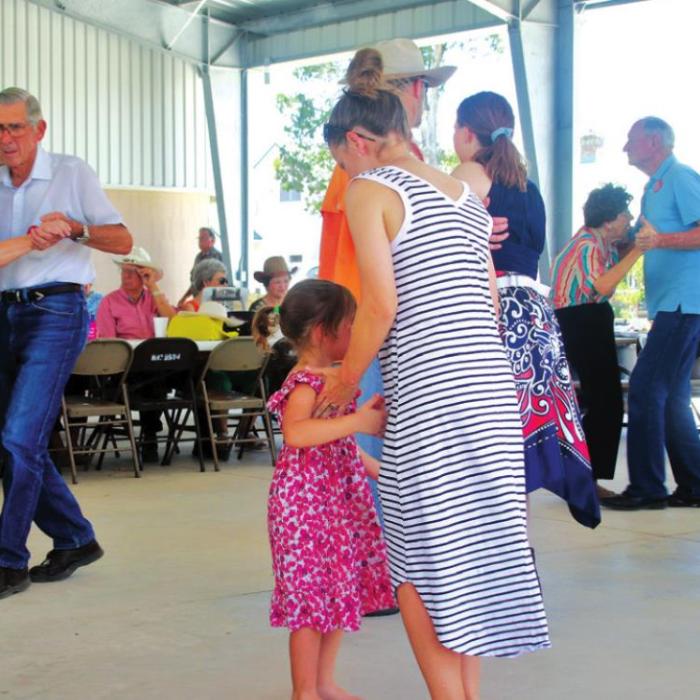 Happy dancers spin to polka music at the Sts. Peter and Paul’s Plum Feast on Sunday, June 26. Photo by Gary E. McKee/Texas Polka News