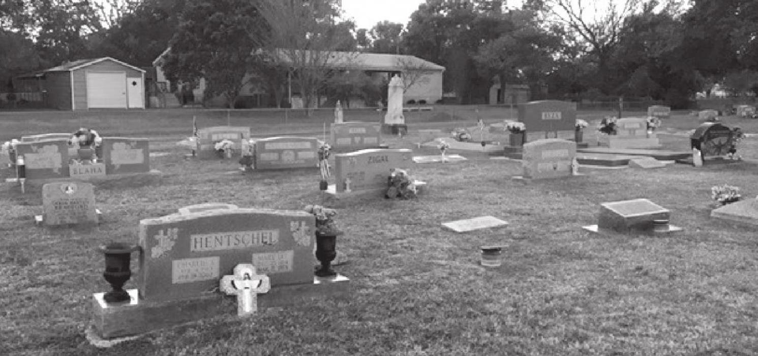 Older Scherrer family graves seen near the back of the photo located in the New La Grange City Cemetery. Photo Courtesy of Katie Janda